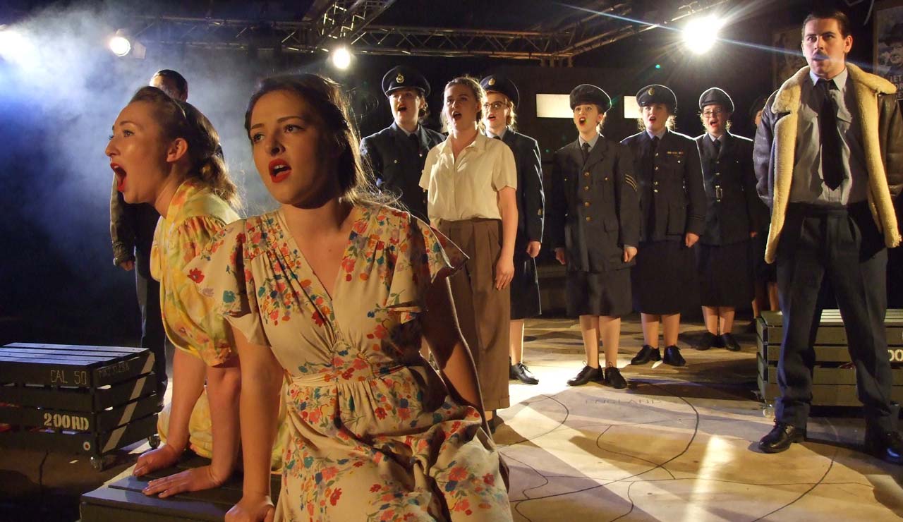 Students performing a musical at the Stanwix Theatre