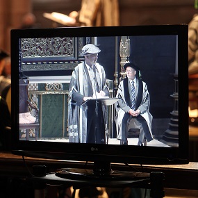 A screen with a graduation 