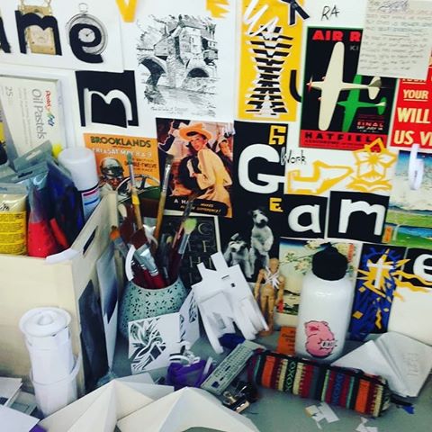 A wall covered in designs as a mood board. A wall covered in designs as a mood board.
