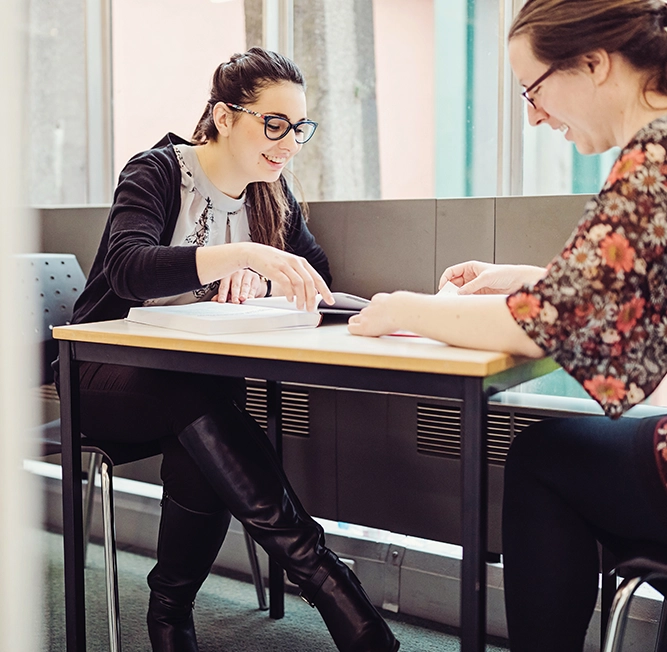 Two students having a meeting