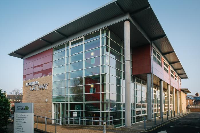 A glass front building. 