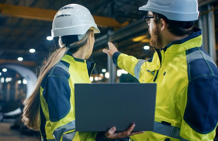 2 workers in Hi-vis jackets.