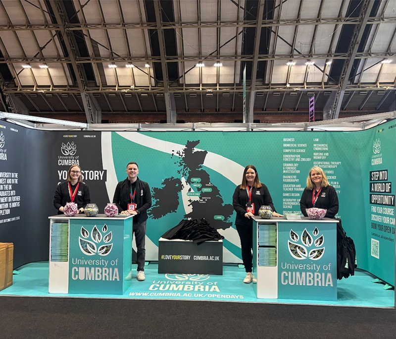 University staff at an exhibition stand