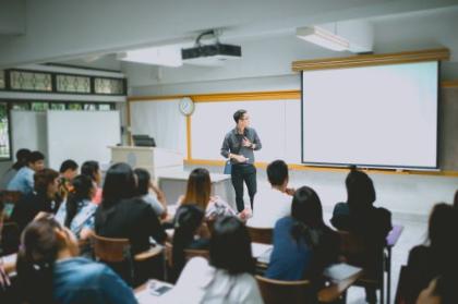 Teacher helping a student
