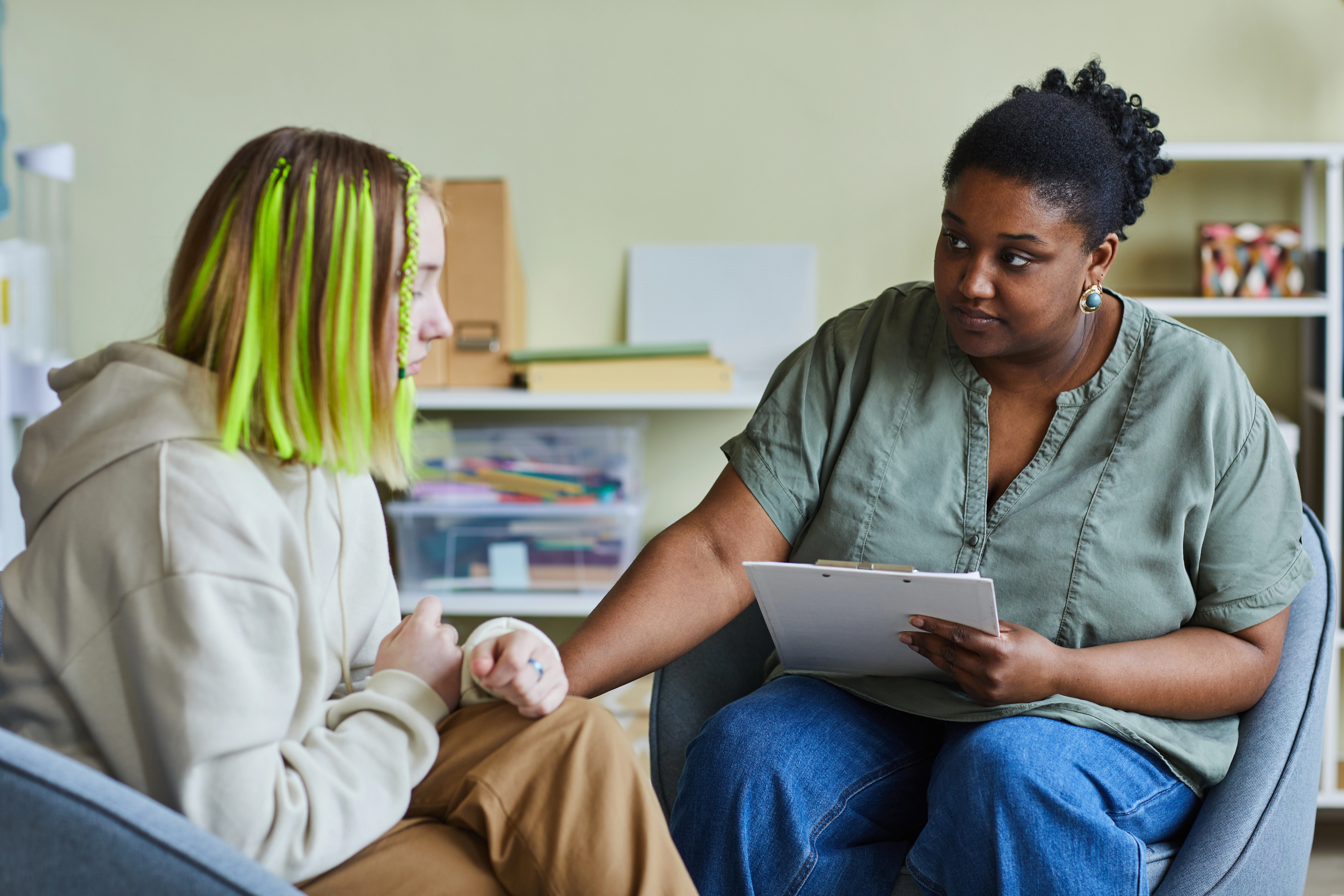Social Worker speaking to client