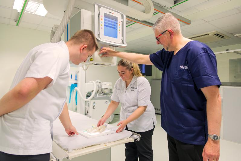 Diagnostic radiography students and lecturer