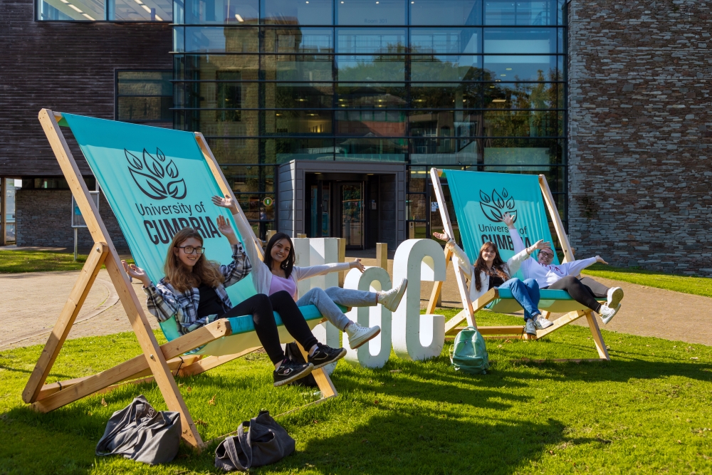 Students sat on deck chairs outside Learning Gateway, Students sat on deck chairs outside Learning Gateway