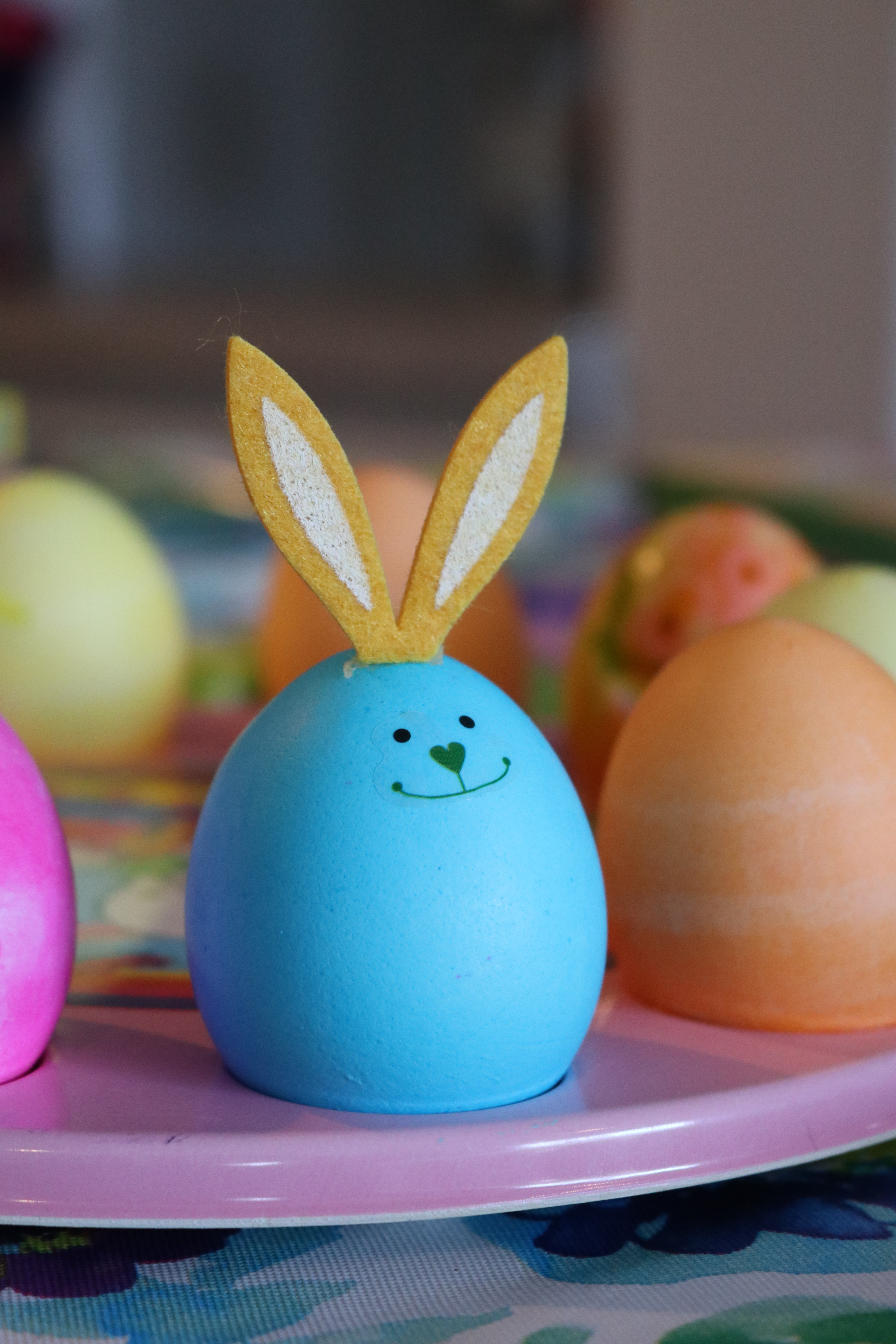 Easter Eggs and Bunny, Blue painted egg with rabbit ears