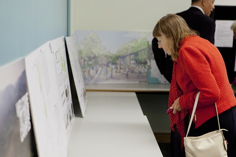 1960s students Ambleside. Woman looking at plans 