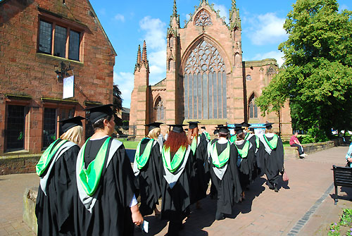 Students walking to their graduation 