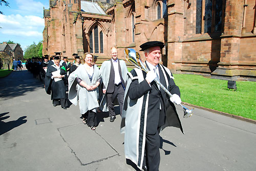 Students walking after graduating