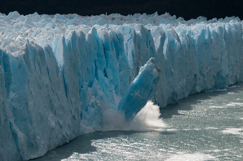 Ice breaking away from the polar ice caps, A large chunk of ice breaking away from the main ice sheet.