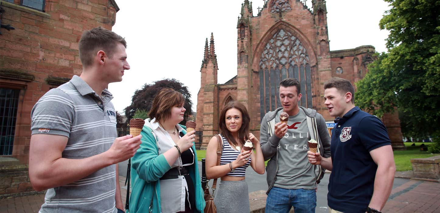 Students eating ice cream by Carlisle Cathedral, Students eating ice cream by Carlisle Cathedral