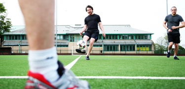 Boys playing football