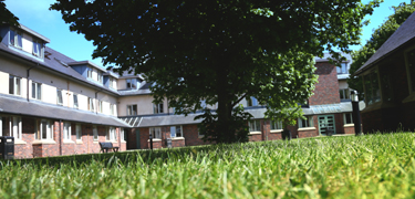 A building with grass infront