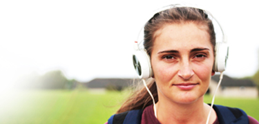 A girl with headphones on her head