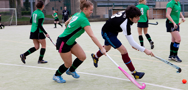 Students playing hockey