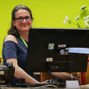 library worker on computer