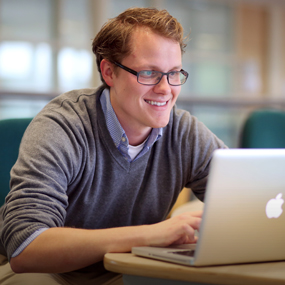 male on computer