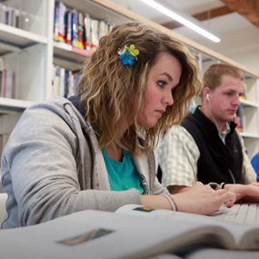 students studying in library