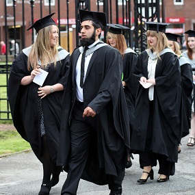 Students walking to their graduation 