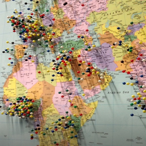 world map with pins