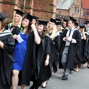 Students walking to their graduation 