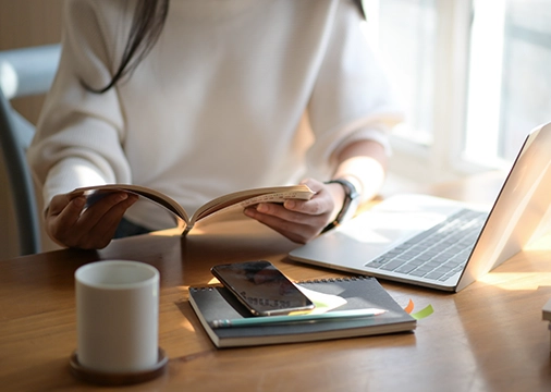 Hands holding a book