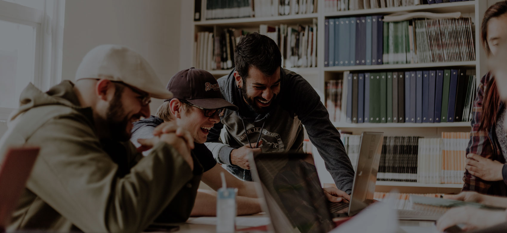 Students laughing while working