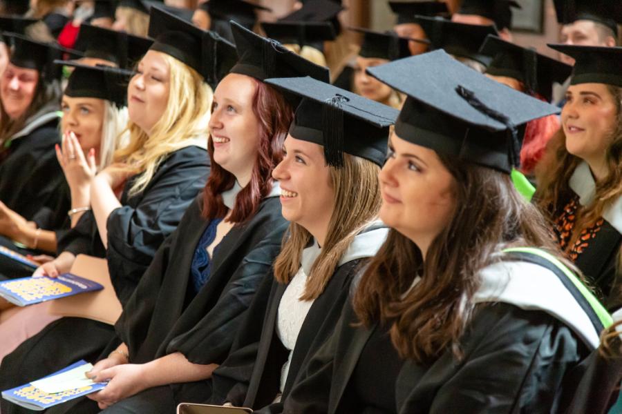 Graduands watching the ceremony.