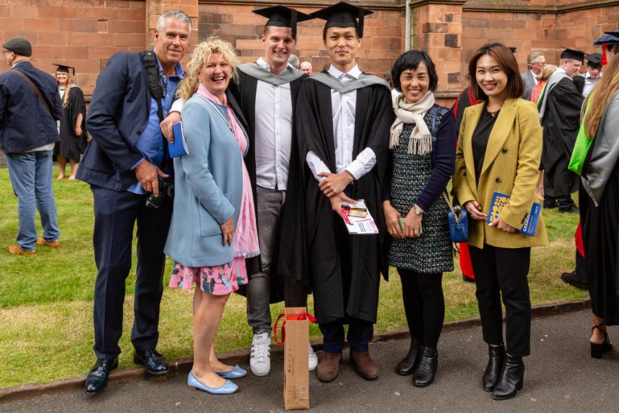 International graduates with family.