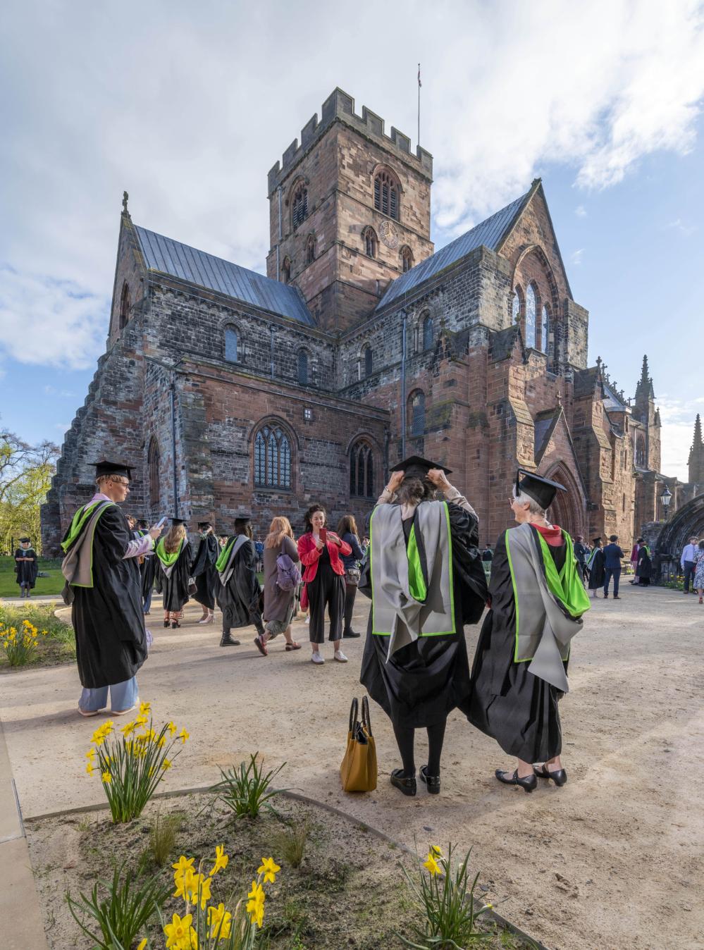 Graduates outside Carlisle Cathedral