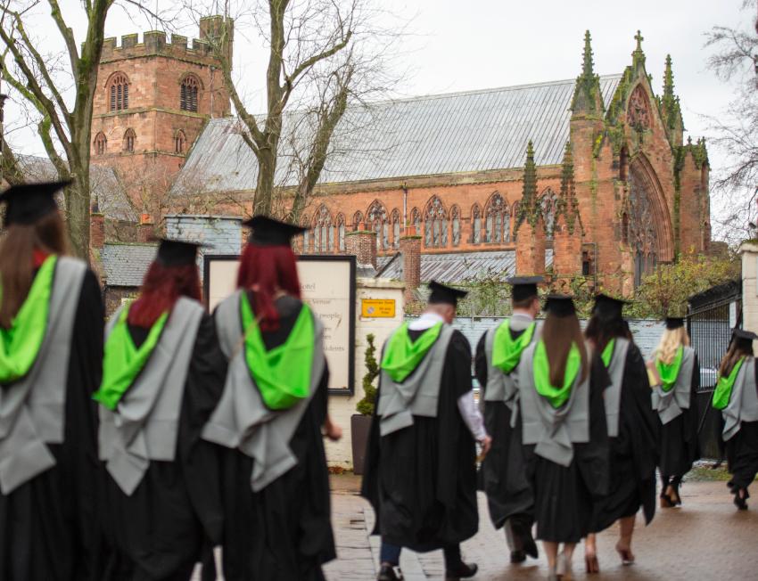 Graduates walking to Cathedral.