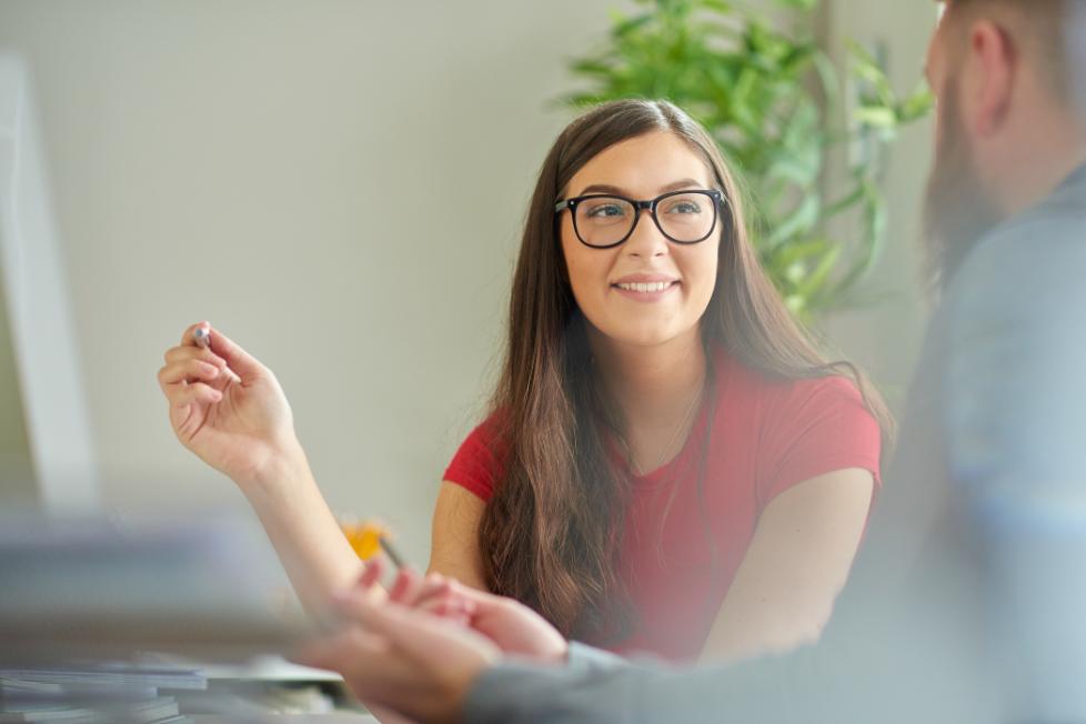 A Student talks to a man.