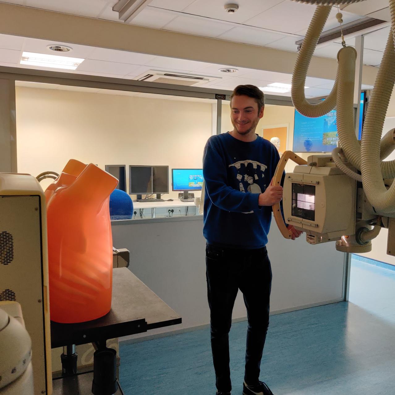 Sam using equipment in the radiography department