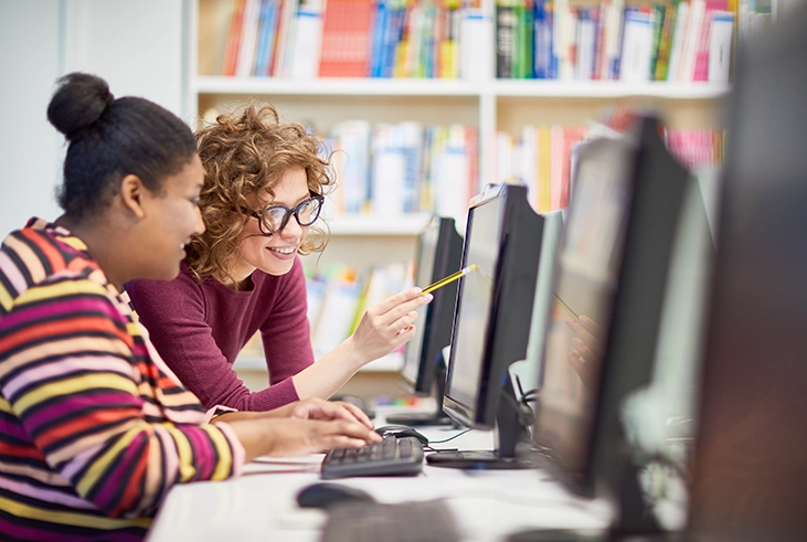 University student in front of a computer
