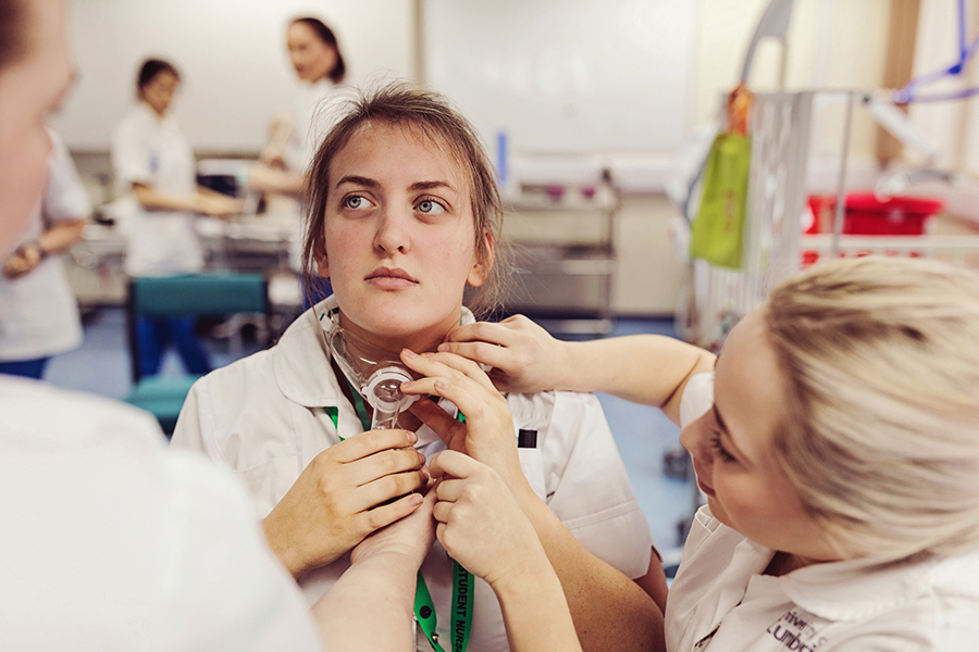 Nursing students applying the treatment Nursing students applying the treatment