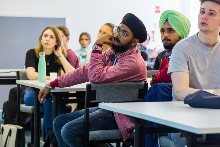 Students enjoying a lecture. Students enjoying a lecture.