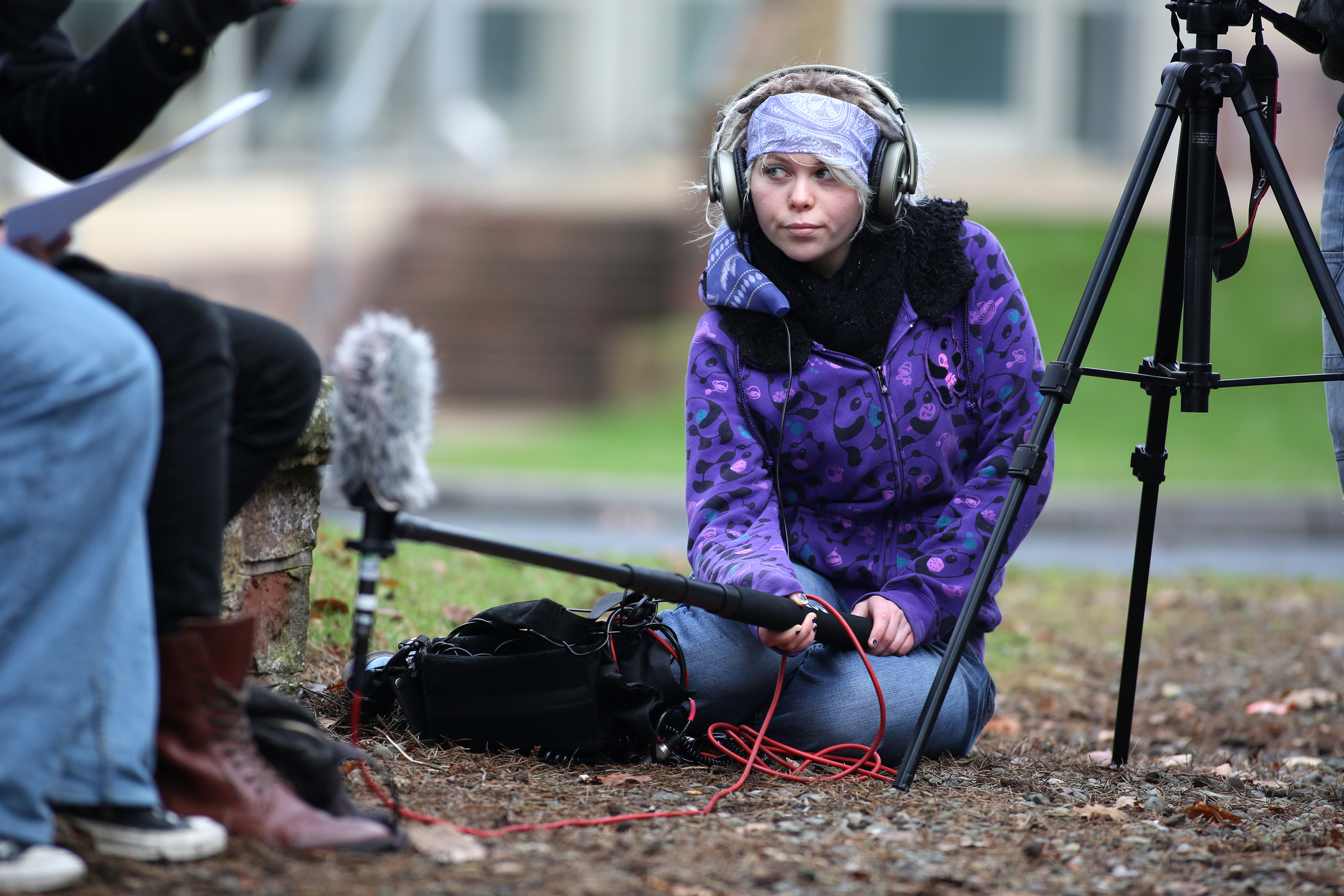 Student with sound equipment. Student with sound equipment.