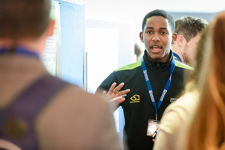 A sport student coaching fellow students