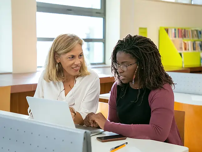 students on a laptop