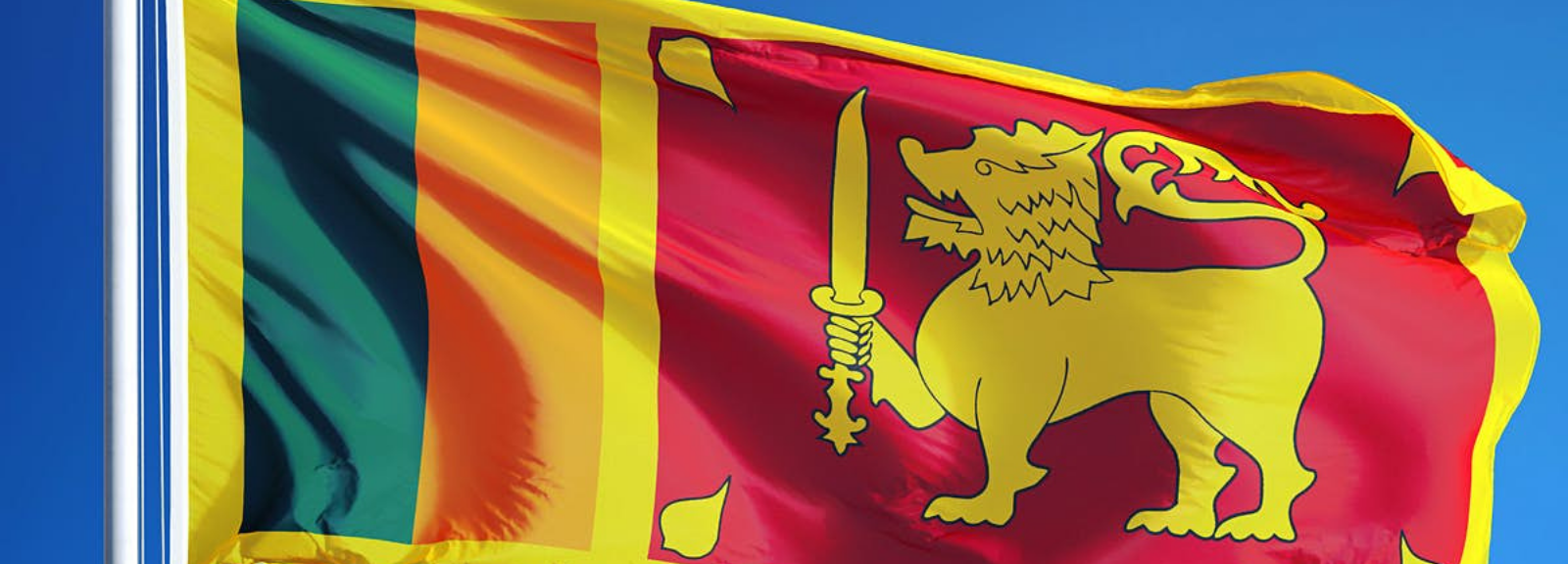 Sri Lankan flag on a pole. 