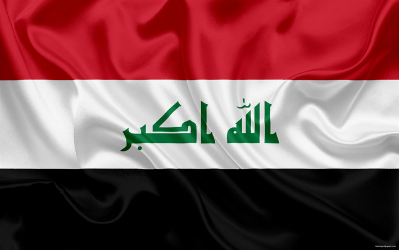 Flag of Iraq on a flagpole.