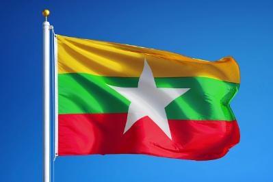 Flag of Myanmar on a flagpole.