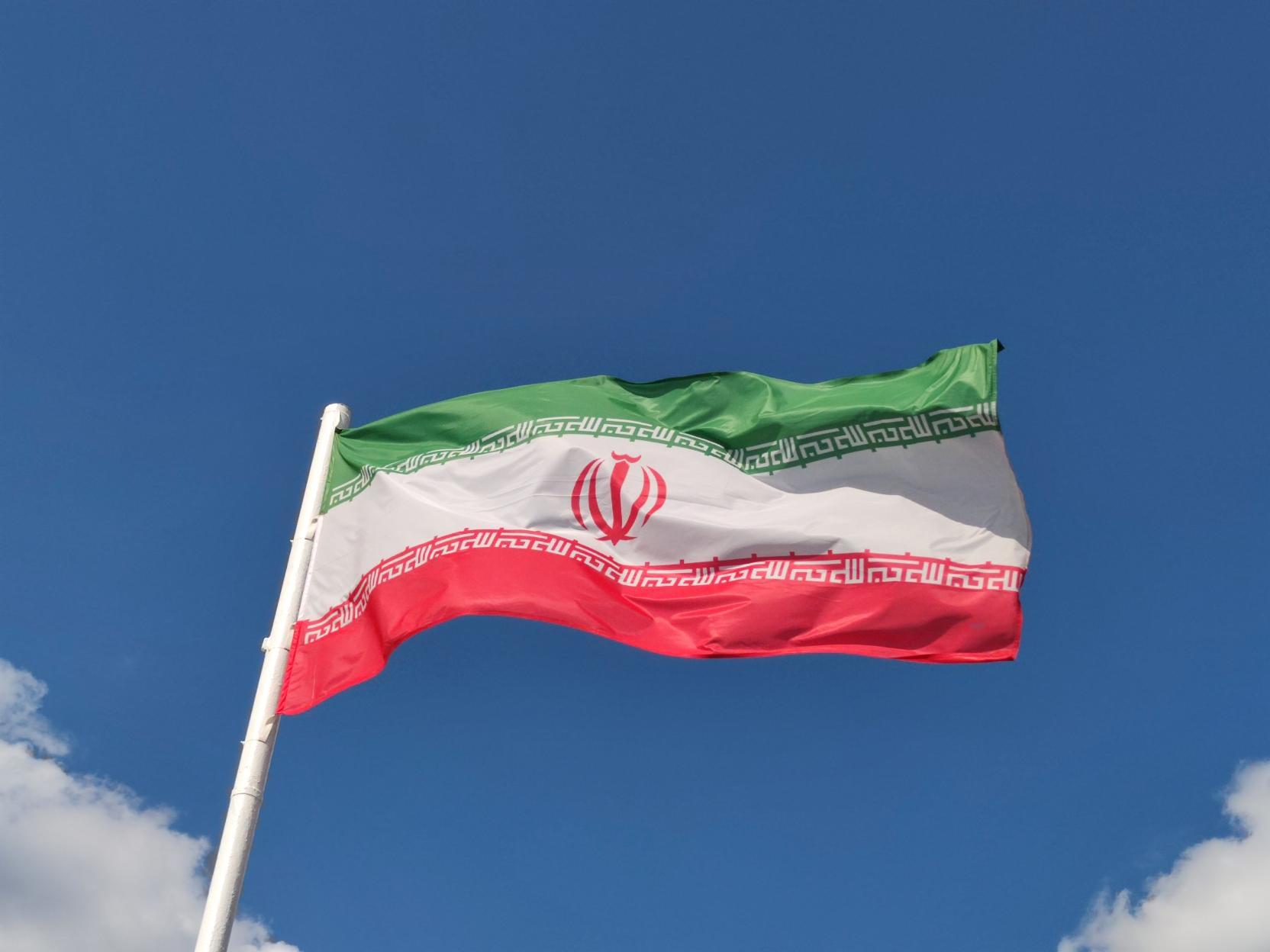 Iran flag on a pole.