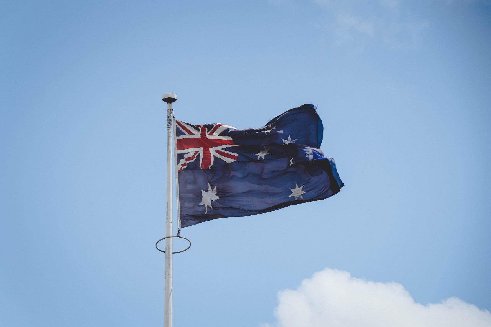 The Australian flag on a pole.