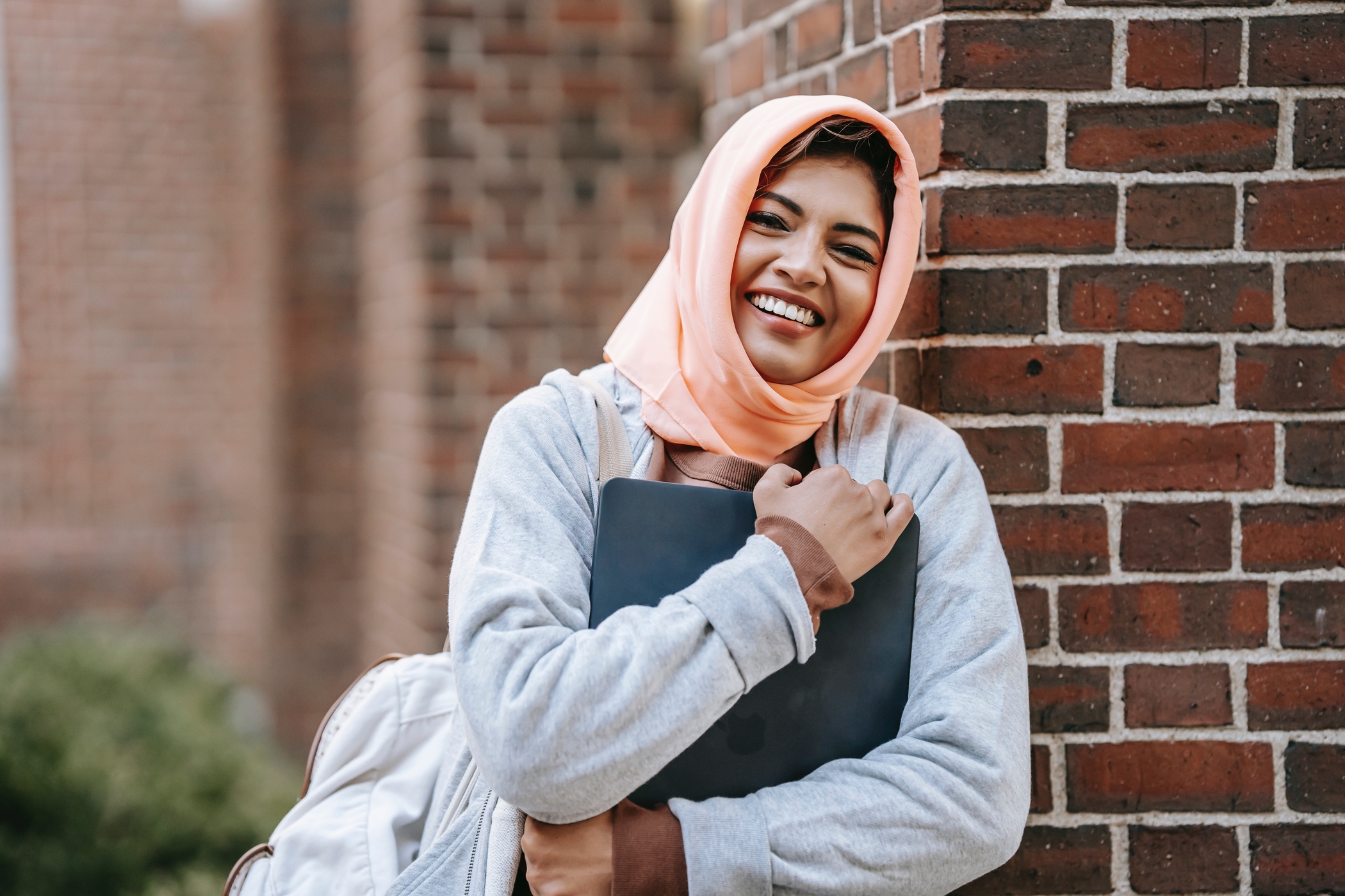 A girl smiles at the camera
