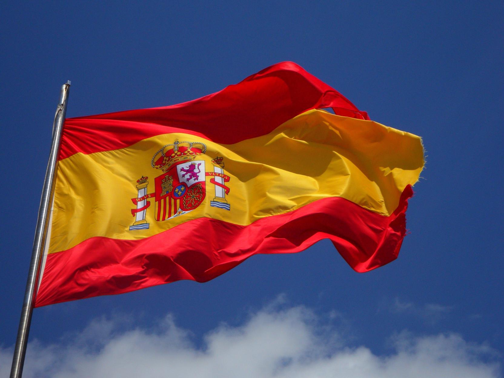 Spanish flag on a pole. 