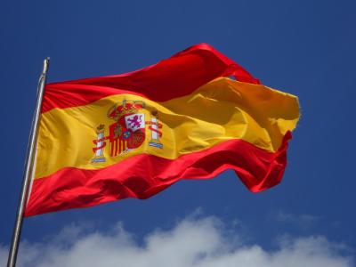 Spanish flag on a pole.