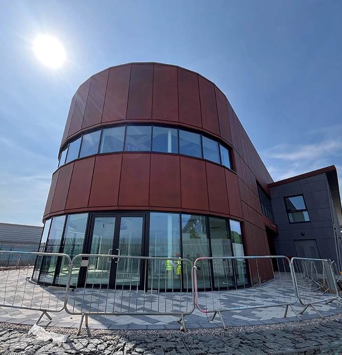 3D render of the Barrow Learning Quarter from a birds-eye perspective of the front of the building.